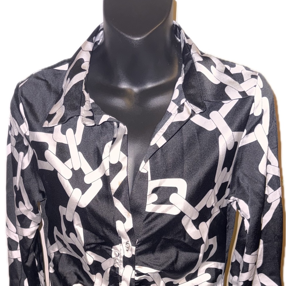 Women’s long sleeve black and white button up dress midi length